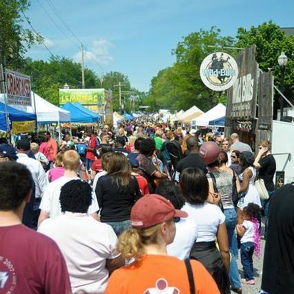Live entertainment at Laurel Main Street Festival with crowd enjoying performance