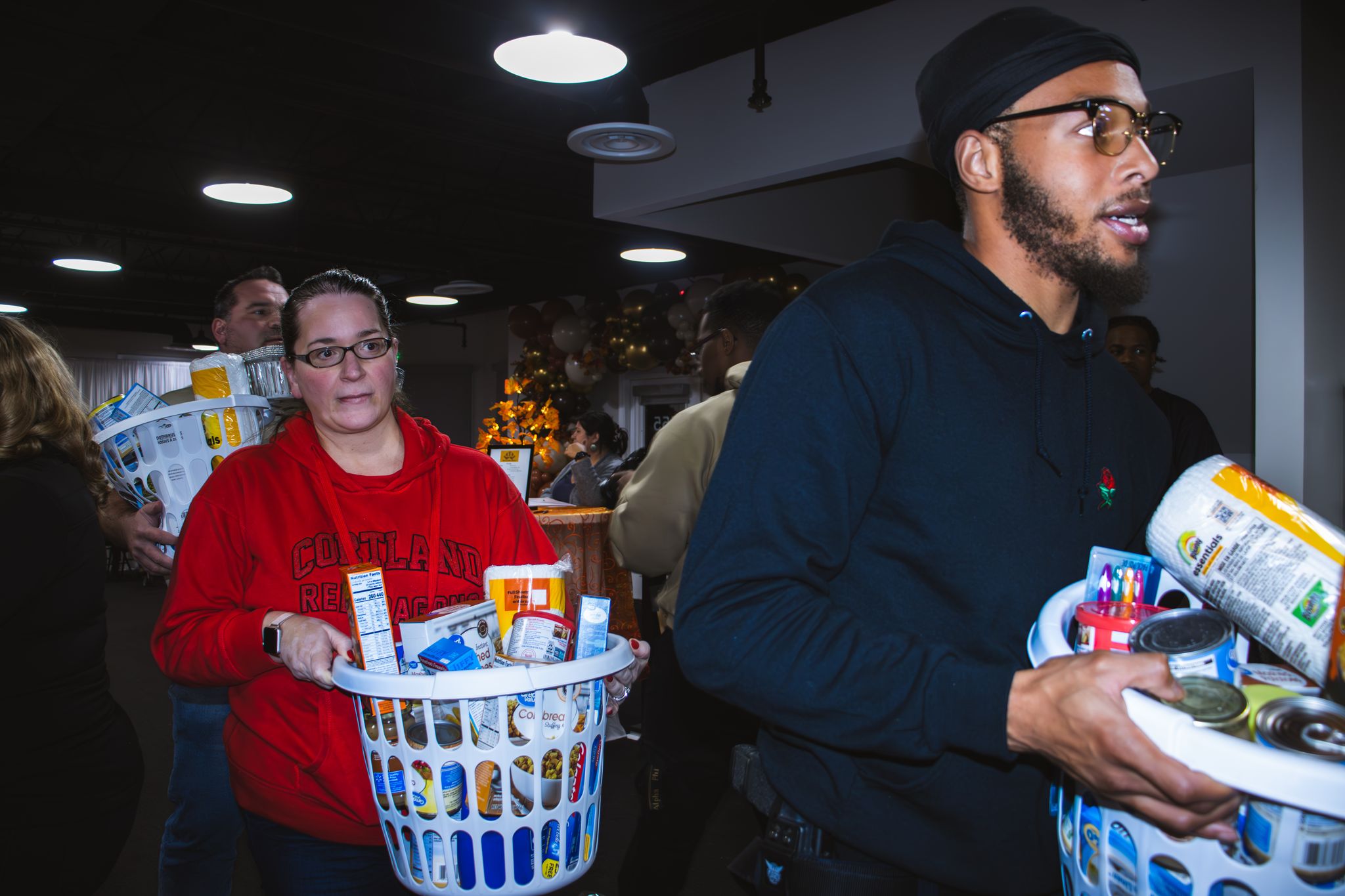 Volunteers celebrating Laurel Blessing Baskets success